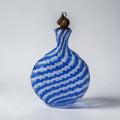 Her Good Eye blue and white swirl glass bottle with copper stopper and rope detail. Murano-style decanter.