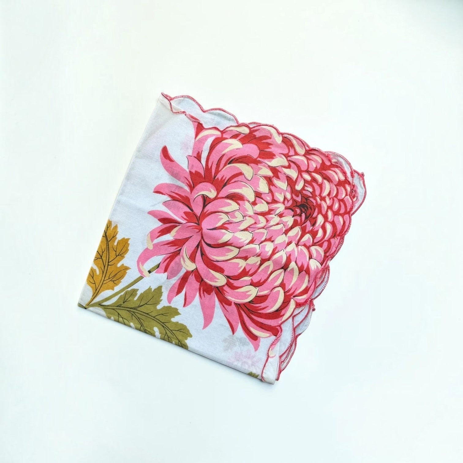 Her Good Eye vintage cotton handkerchief with pink chrysanthemum print, olive foliage, and scalloped pink stitched edges.