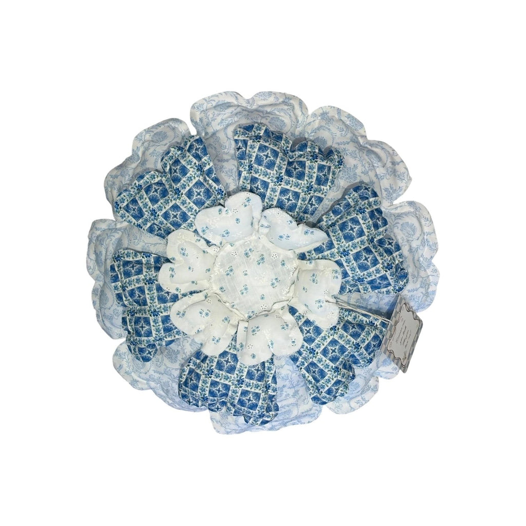 Her Good Eye decorative floral throw pillow with layered blue and white fabric petals in a cottage-core style.