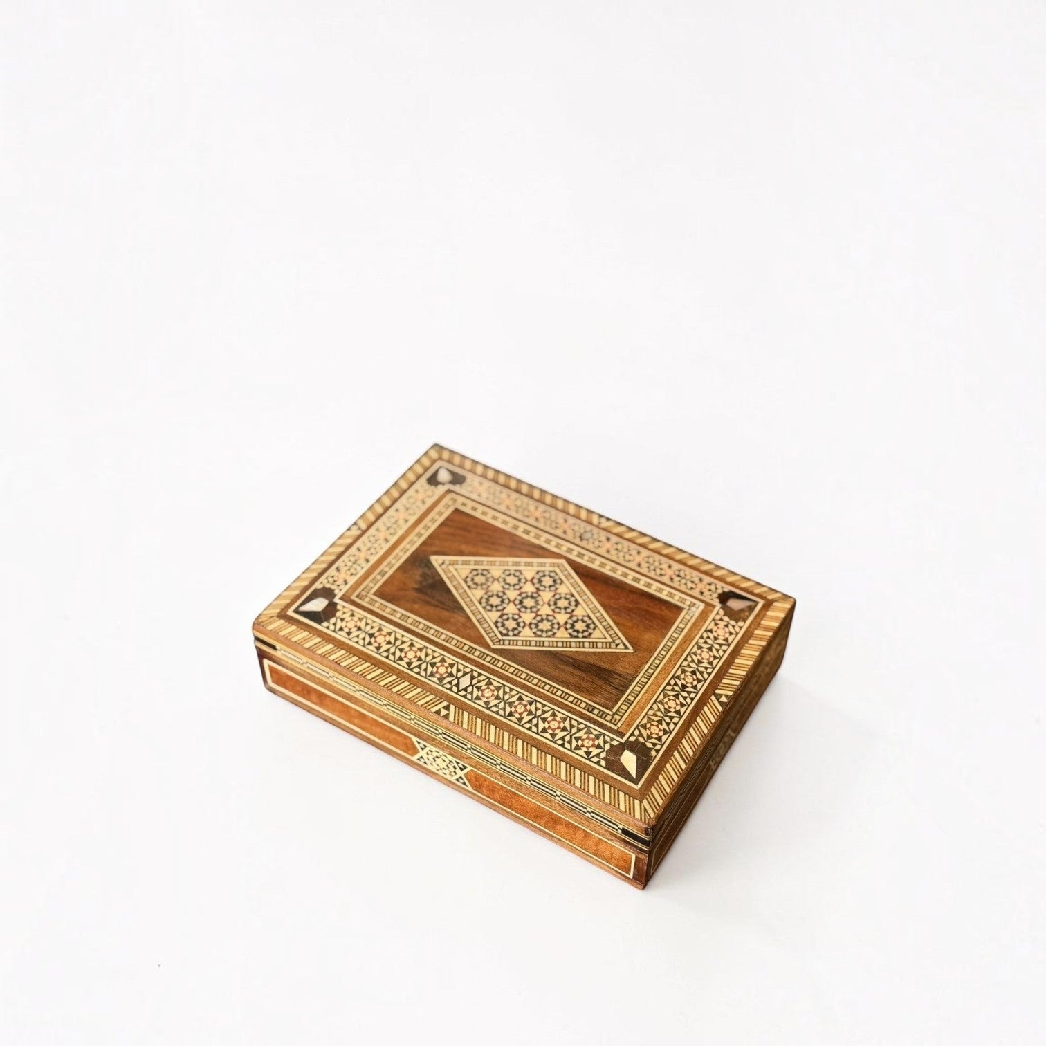 Her Good Eye handcrafted wooden keepsake box with intricate geometric marquetry inlay and vintage decorative patterns.