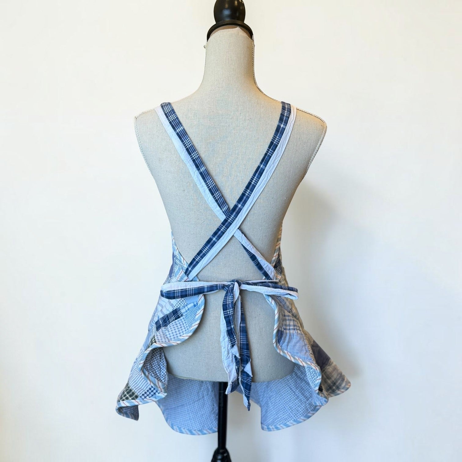 Her Good Eye vintage patchwork kitchen apron with blue gingham and plaid cotton fabric and cross-back tie straps