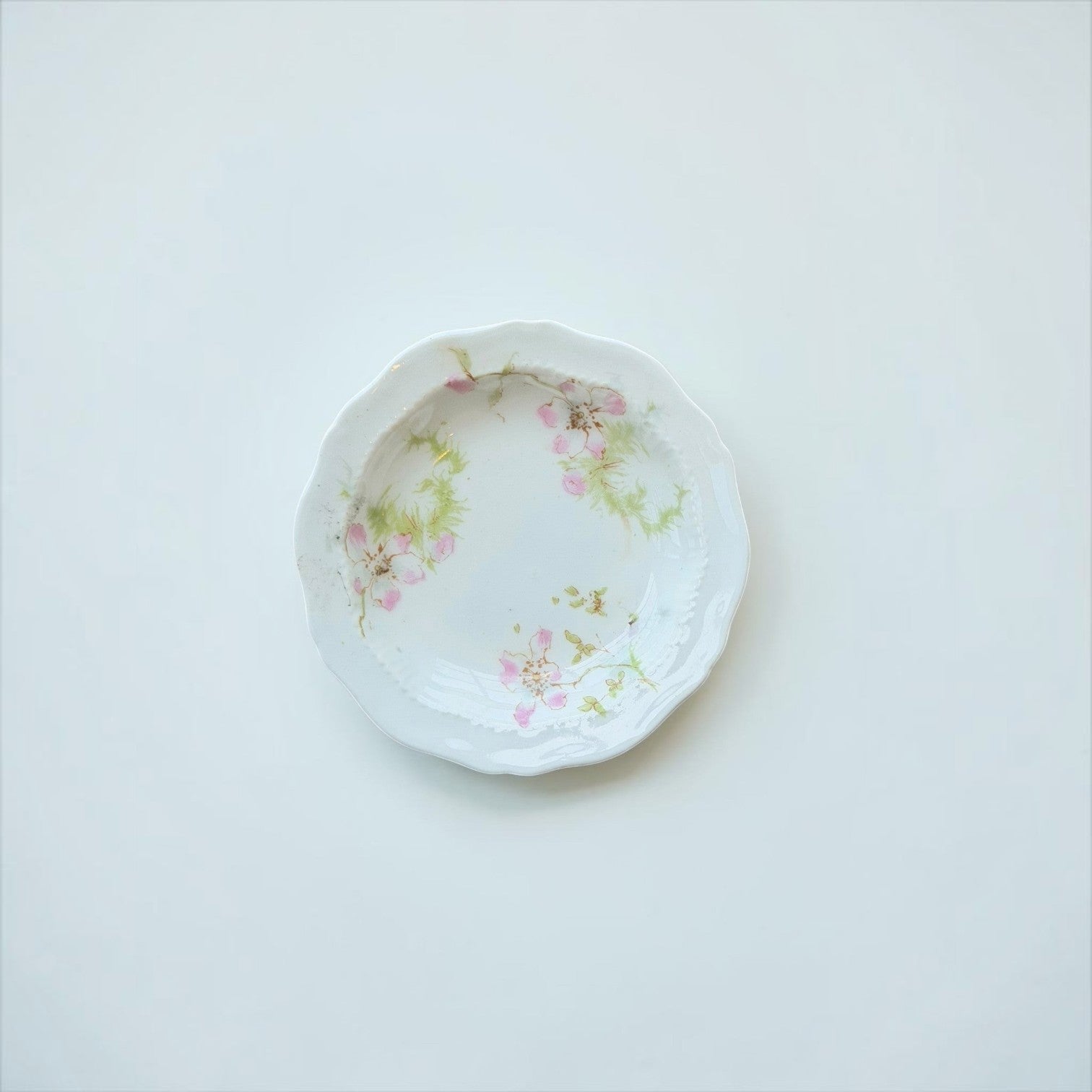 Her Good Eye vintage porcelain serving dish with scalloped edges and hand-painted pink floral watercolor design.